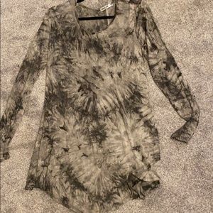 It a xxxL shirt however I wore it has a dress!